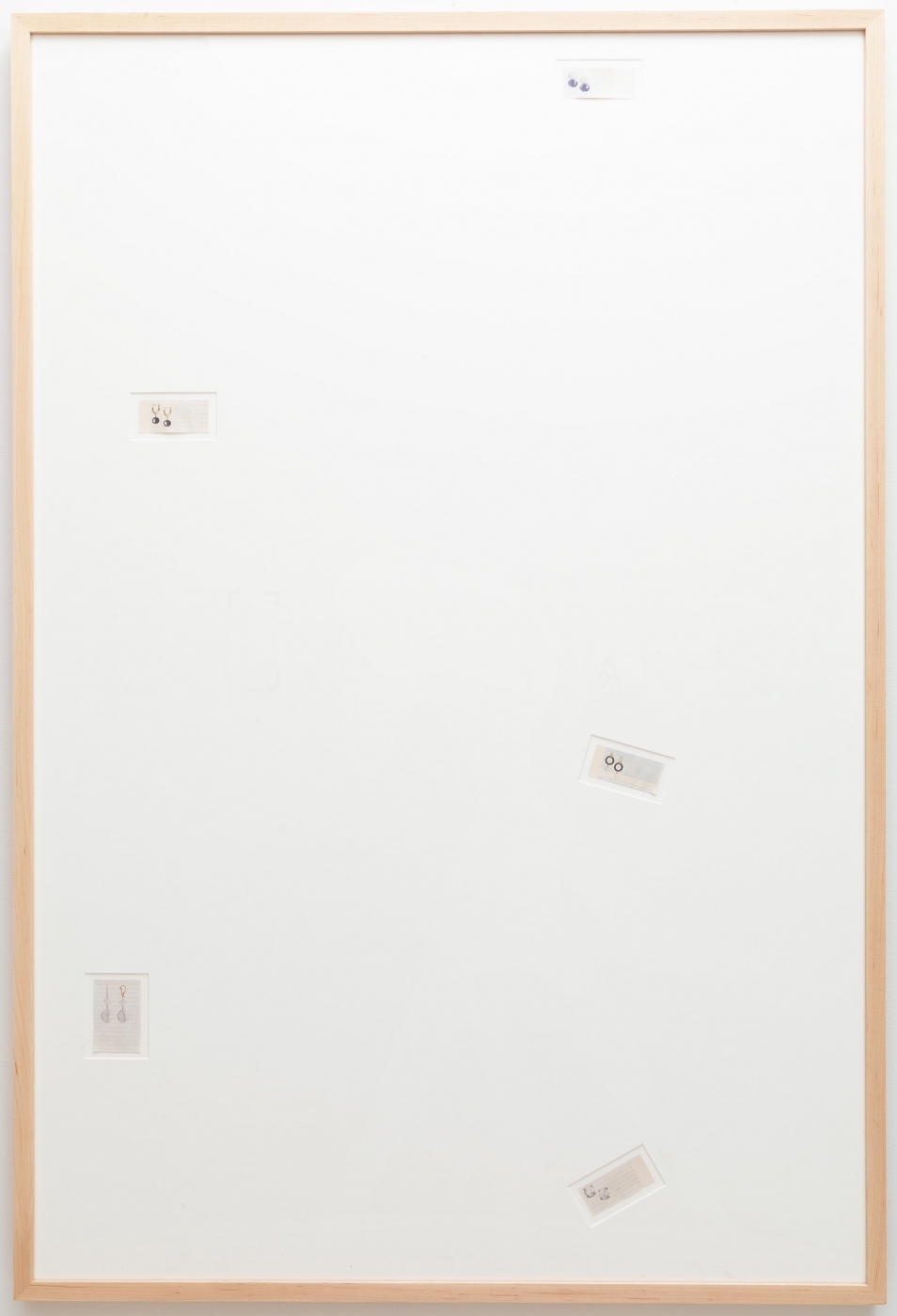 Pearl Puddles, 2012,
Erased New Yorker advertisements in artist frame, 33 1/2 × 45 1/2 inches