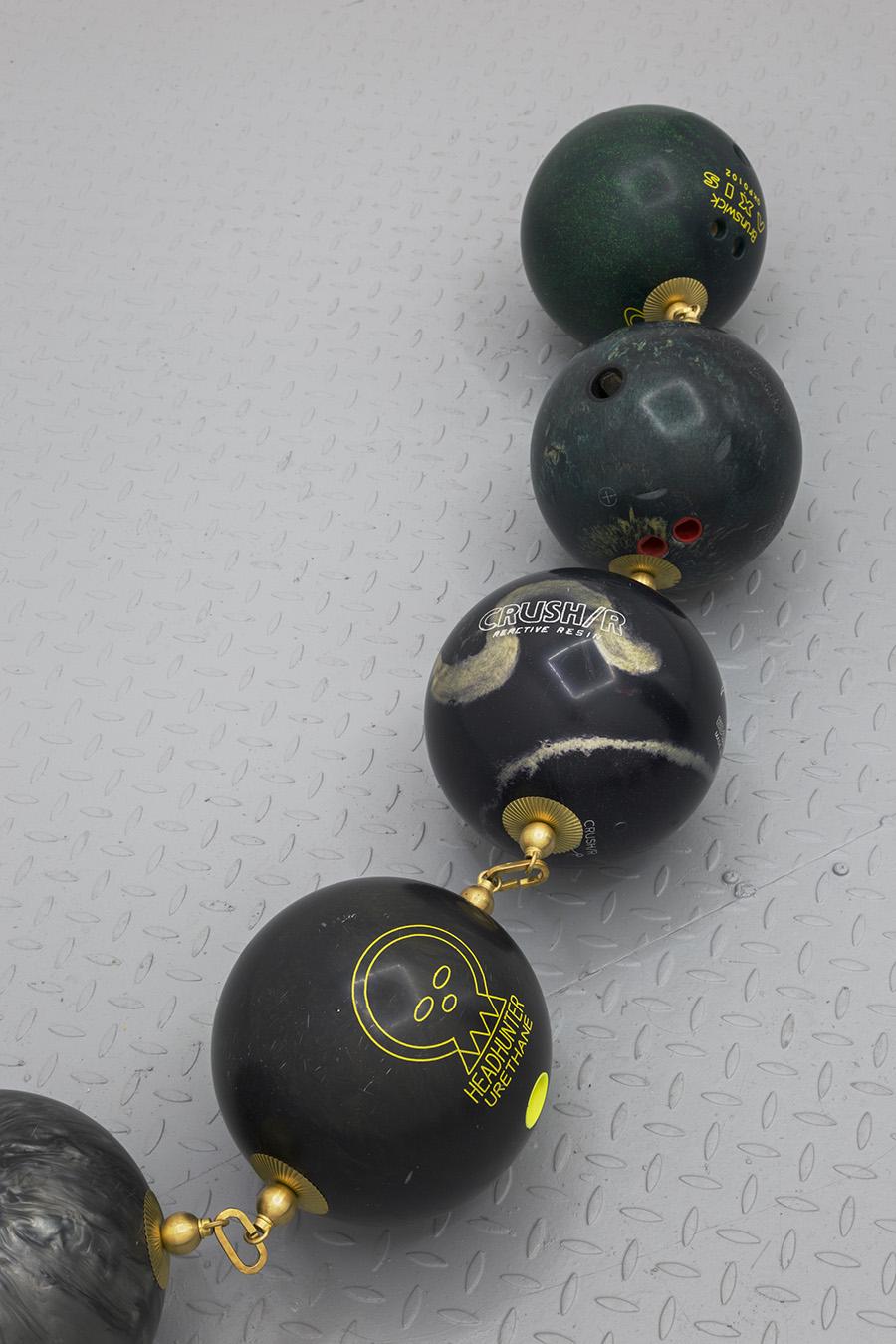 Barbed Wire (detail), 2017, Bowling balls, brass, dimensions variable