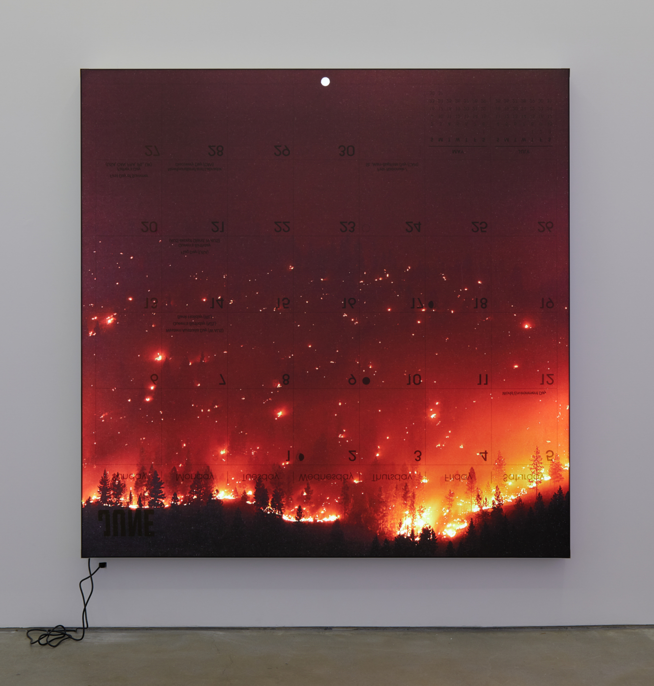 Mungo Thomson, Wildfire (June), 2022. Double-sided UV-cured print on samba fabric, custom LED lightbox, 77 x 77 x 3½ in. (195.6 x 195.6 x 8.9 cm)