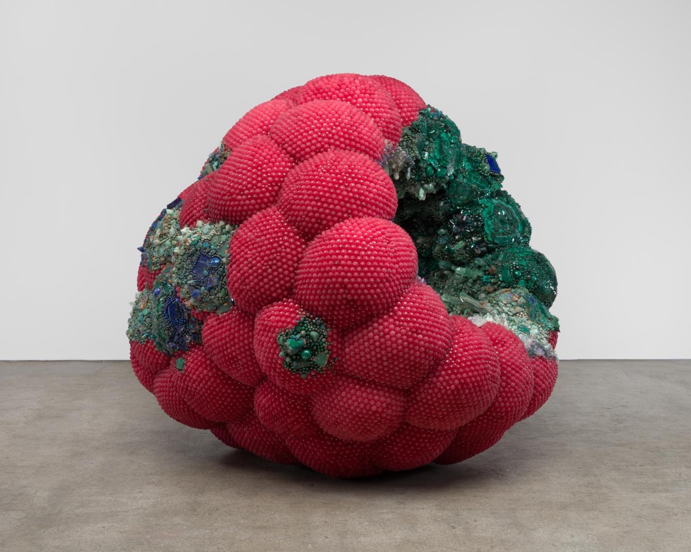 Dreamhouse, 2025. Malachite, azurite, lapis lazuli, amazonite, aventurine, turquoise, chrysocolla, magnesite, howlite, amethyst, garnet, serpentine, quartz, chalcedony and quartz stalactite, fluorite, coral chalcedony, zeolite, larimar, sodalite, calcite, acrylic, steel, aquaresin, stainless-steel nails, and steel pins on coated polystyrene, 83 1/2 x 83 1/2 x 86 1/2 in. (212.1 x 212.1 x 219.7 cm)