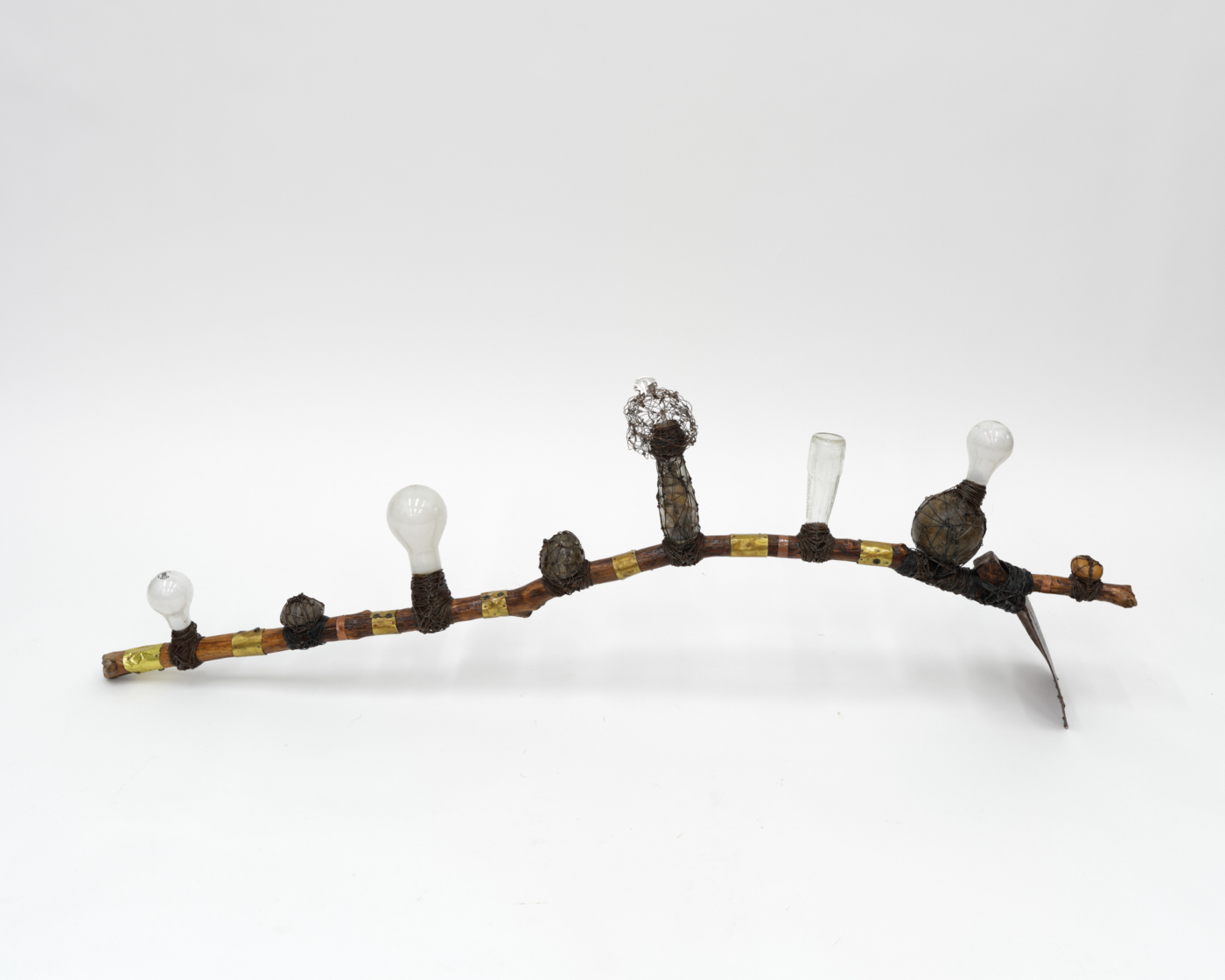 Staff, 2004. Screws, Wire, Light Bulbs, Stones, Baseball, Metal, Wood, Nails, Bottles, 18¾ x 56 x 7 in. (47.63 x 142.24 x 17.78 cm)