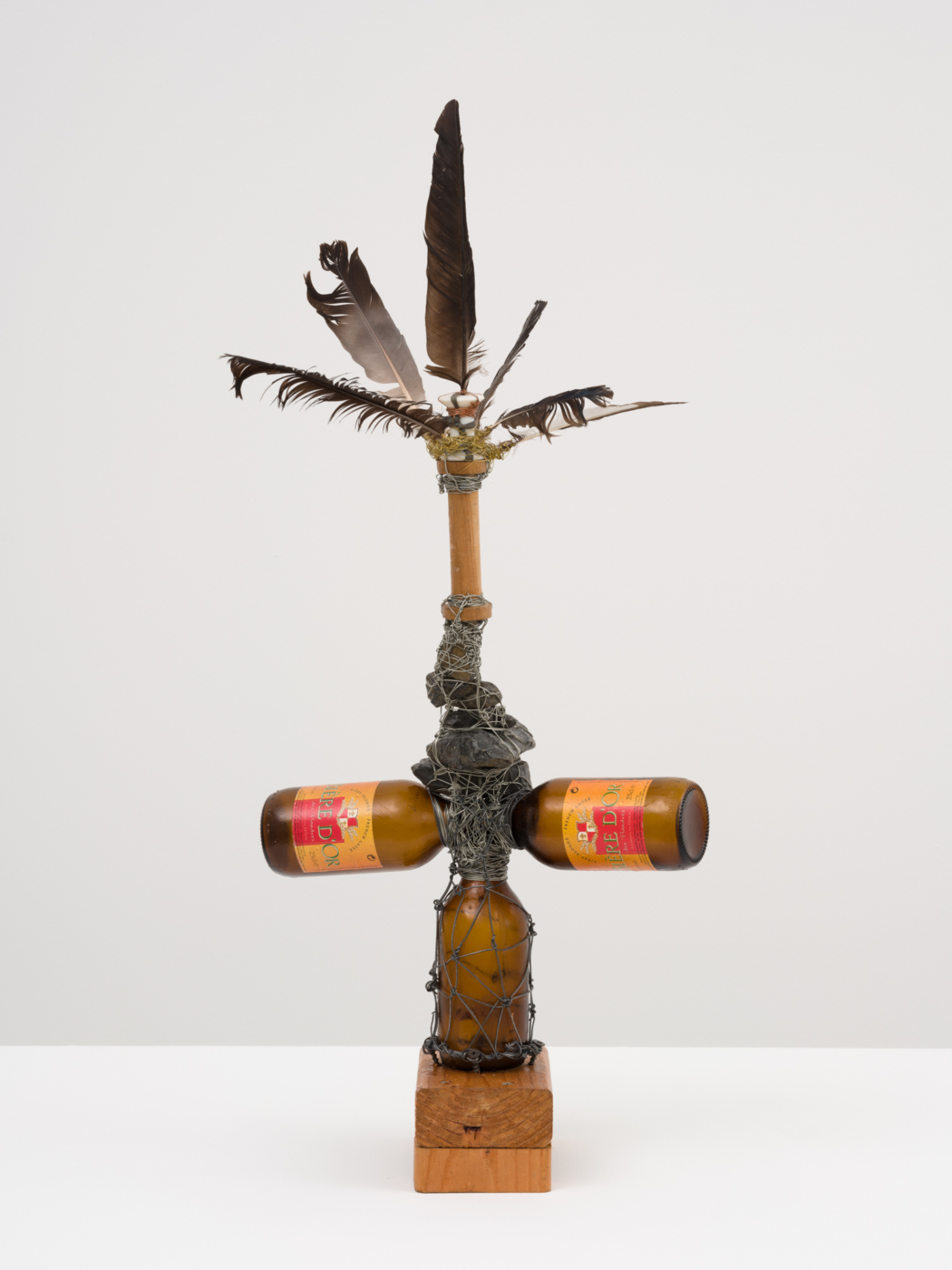 Brown Light in Dublin, 2008. Wire, feathers, stones, cloth, bottle, wood, screws and plastic, 11 x 4¾ x 6½ in. (28.00 x 12.00 x 16.50 cm)