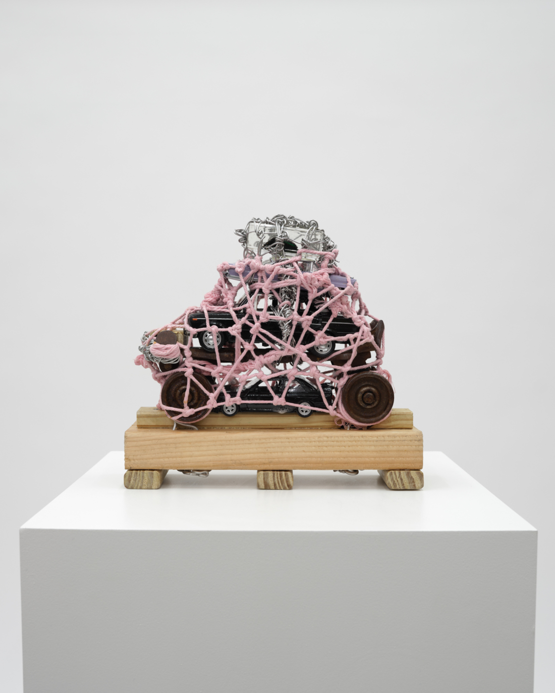 Bug in the Cars, 2024. Toy Cars, Wire, Insect, Roller Skate, Wood, Glue, Polyurethane, Screws, 11 x 11½ x 4 in. (27.94 x 29.21 x 10.16 cm)