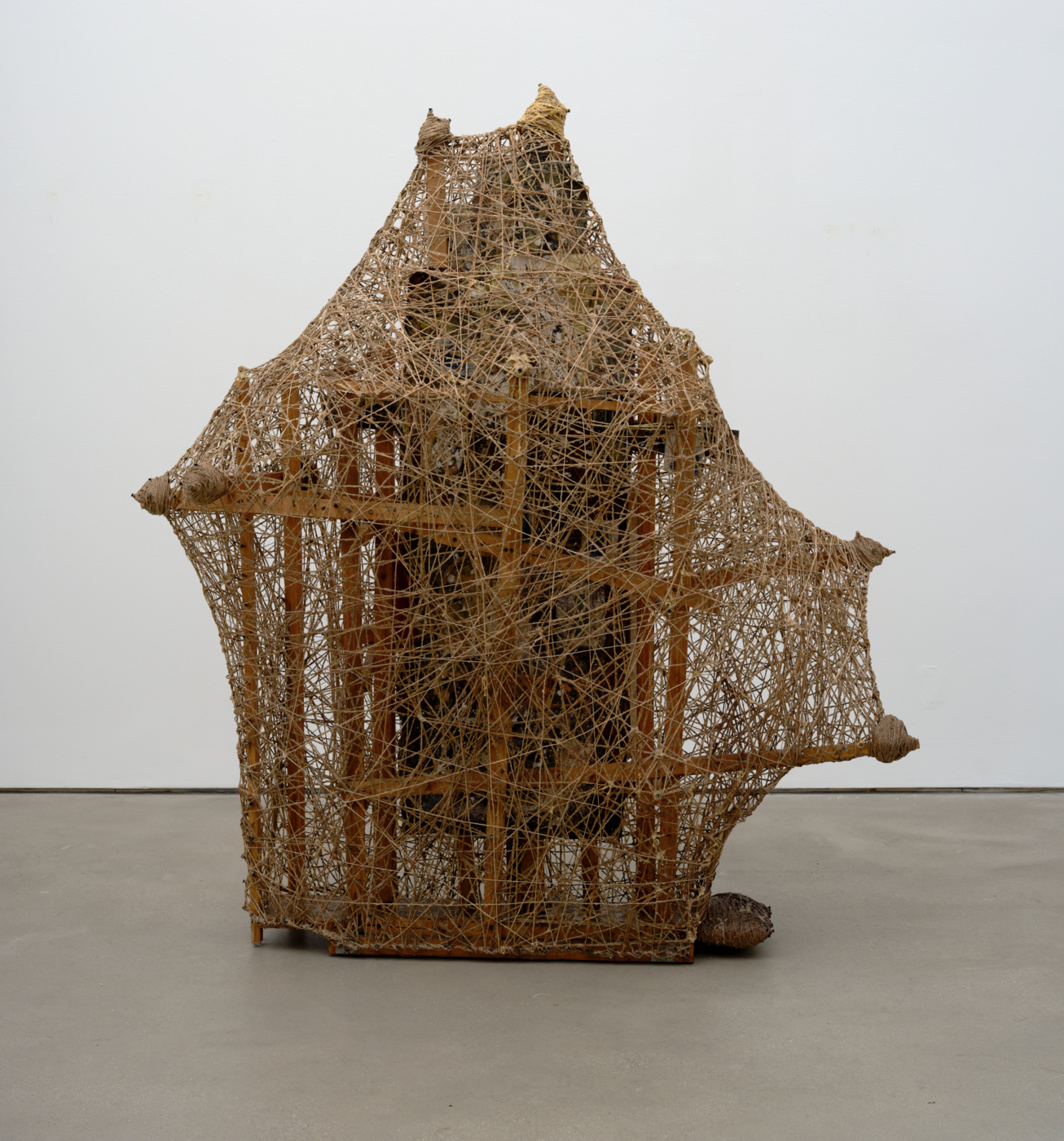Sexual Tension, 1992. Rope, wood, metal, glue, paper, charcoal, pastel, paint, pen, plastic, wire, drawings on paper, gesso and screws, 73 x 60 x 30 3/4 in. (185.42 x 152.40 x 78.11 cm)