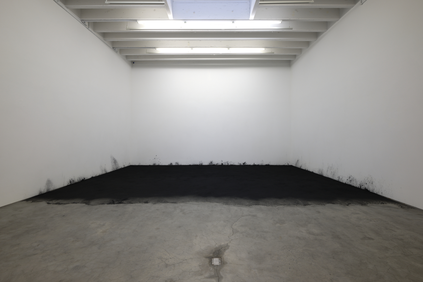 Graphite Piece, 1969/2026. Graphite, dimensions variable