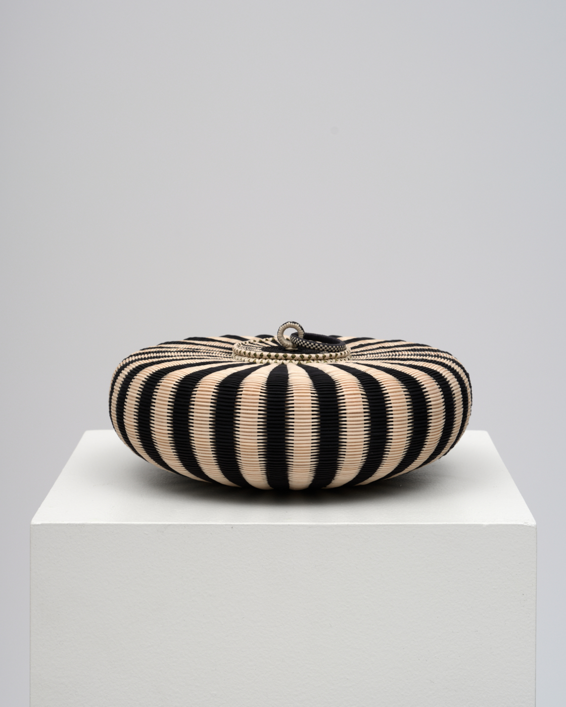 Urchin, 2026. Ash, sweetgrass, and synthetic dye, 4 x 9 7/8 x 9 7/8 in. (10.16 x 25.08 x 25.08 cm)