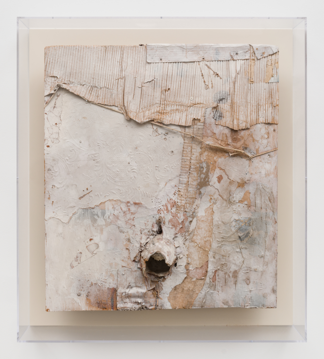 Bruce Conner, ST. GERYON, 1959. Paint, cardboard, wallpaper, paper, string, fabric, wire, doll head, plaster dental mold, nails, staples and metal tack on plywood, 28 x 24 1/2 x 4 in. (71.12 x 62.23 x 10.16 cm); 32 1/4 x 28 7/8 x 6 1/2 in. (81.92 x 73.34 x 16.51 cm) framed