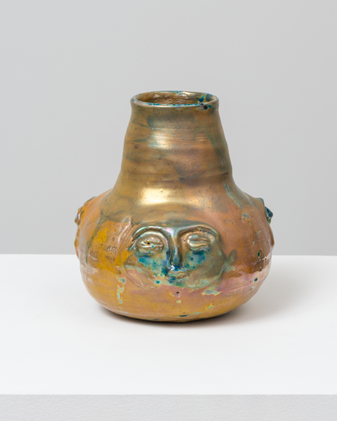 Beatrice Wood, Vessel with Faces, n.d. Earthenware with luster glaze, 6 x 5 x 5 in. (15.24 x 12.70 x 12.70 cm)